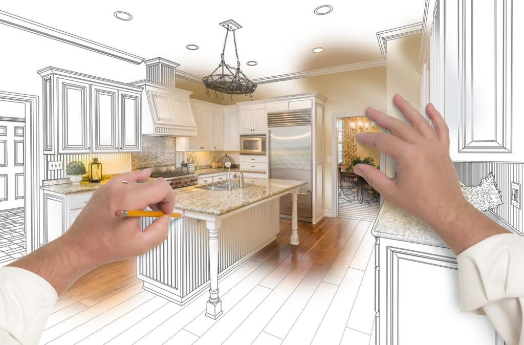 Hands Sketching a Custom Kitchen